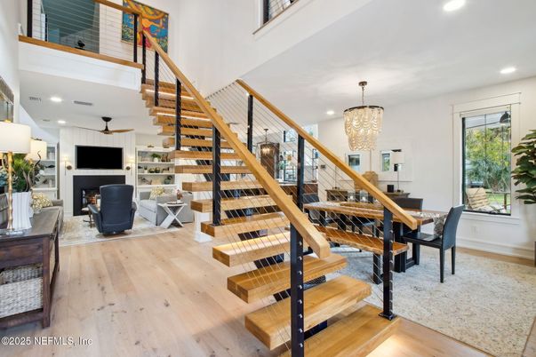 Chandelier, Dining room, Fireplace, Interior, Recessed Lighting, Wood Texture Flooring