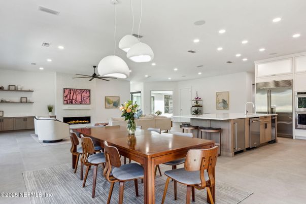 Dining room, Fireplace, Interior, Kitchen, Living room, Pendant Lights, Recessed Lighting, Stainless Steel Appliances
