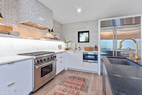 Interior, Kitchen, Recessed Lighting, Stainless Steel Appliances, Stone Walls, Wood Texture Flooring