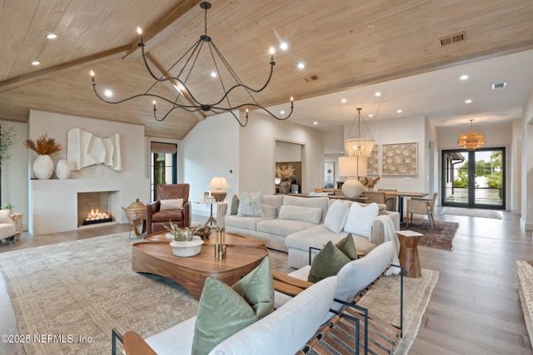 Chandelier, Dining room, Fireplace, Interior, Living room, Pendant Lights, Recessed Lighting, Wooden Beams, Wooden Ceilings, Wood Texture Flooring