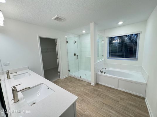 Bathroom, Dual Sink Vanities, Glass Shower, Interior, Recessed Lighting, Wood Texture Flooring