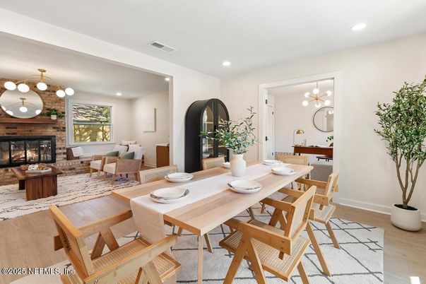 Dining room, Fireplace, Interior, Living room, Pendant Lights, Recessed Lighting, Stone Walls, Wood Texture Flooring