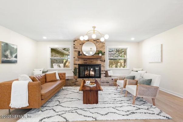 Fireplace, Interior, Living room, Recessed Lighting, Stone Walls, Wood Texture Flooring