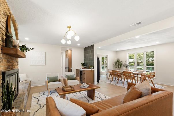 Dining room, Fireplace, Interior, Living room, Pendant Lights, Recessed Lighting, Wood Texture Flooring