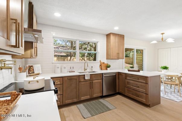 Dining room, Interior, Kitchen, Recessed Lighting, Stainless Steel Appliances, Wood Texture Flooring