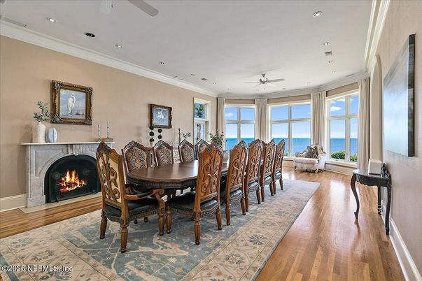 Dining room, Fireplace, Interior, Recessed Lighting, Water, Wood Texture Flooring
