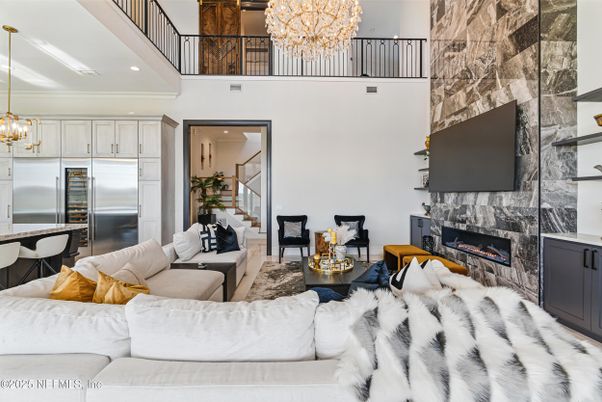 Chandelier, Fireplace, Interior, Kitchen, Living room, Recessed Lighting, Stainless Steel Appliances