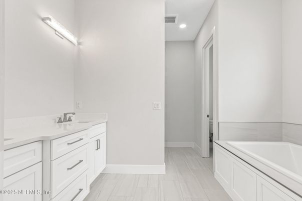 Bathroom, Dual Sink Vanities, Interior, Recessed Lighting, Wood Texture Flooring
