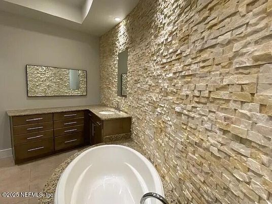 Bathroom, Dual Sink Vanities, Interior, Recessed Lighting, Stone Walls