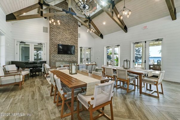 Dining room, Fireplace, Interior, Living room, Pendant Lights, Piano, Stone Walls, Wooden Beams, Wood Texture Flooring