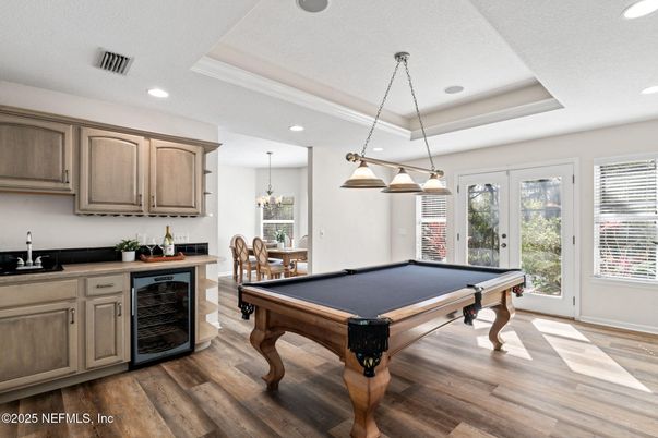 Billiard Table, Chandelier, Dining room, Game Room, Interior, Pendant Lights, Recessed Lighting, Wood Texture Flooring