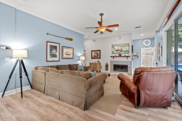 Fireplace, Interior, Living room, Recessed Lighting, Stone Walls, Wood Texture Flooring