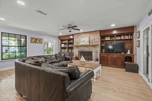 Fireplace, Interior, Living room, Recessed Lighting, Stone Walls, Wood Texture Flooring