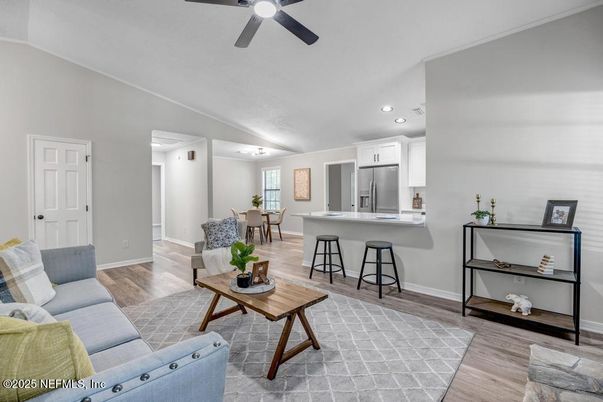 Dining room, Interior, Kitchen, Living room, Recessed Lighting, Stainless Steel Appliances, Wood Texture Flooring