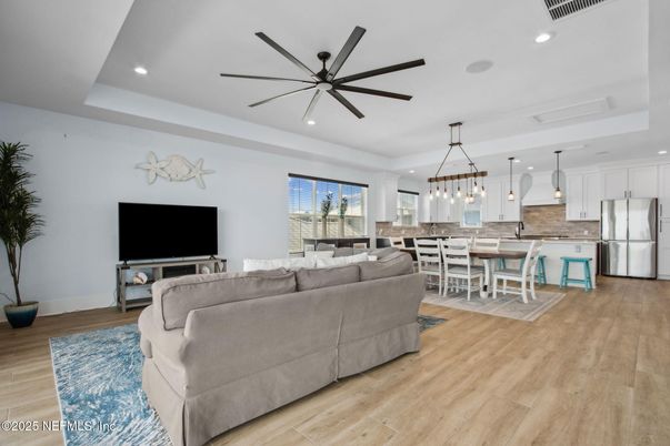Dining room, Interior, Kitchen, Living room, Pendant Lights, Recessed Lighting, Stainless Steel Appliances, Wood Texture Flooring
