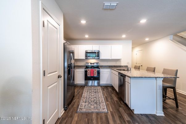 Interior, Kitchen, Recessed Lighting, Stainless Steel Appliances, Wood Texture Flooring