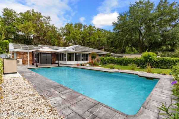 Exterior, Pool, Solar Panels