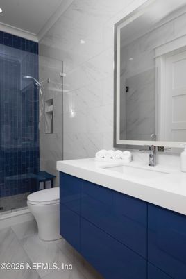Bathroom, Dual Sink Vanities, Glass Shower, Interior, Marble Walls, Recessed Lighting