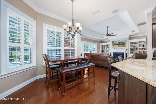 Chandelier, Dining room, Fireplace, Interior, Living room, Wood Texture Flooring