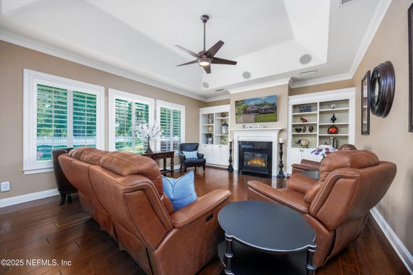 Fireplace, Interior, Living room, Piano, Recessed Lighting, Wood Texture Flooring