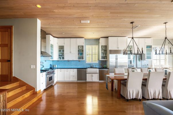 Dining room, Interior, Kitchen, Pendant Lights, Recessed Lighting, Stainless Steel Appliances, Wooden Ceilings, Wood Texture Flooring