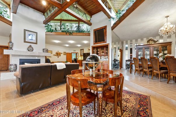 Chandelier, Dining room, Fireplace, Interior, Living room, Recessed Lighting, Wooden Beams, Wooden Ceilings