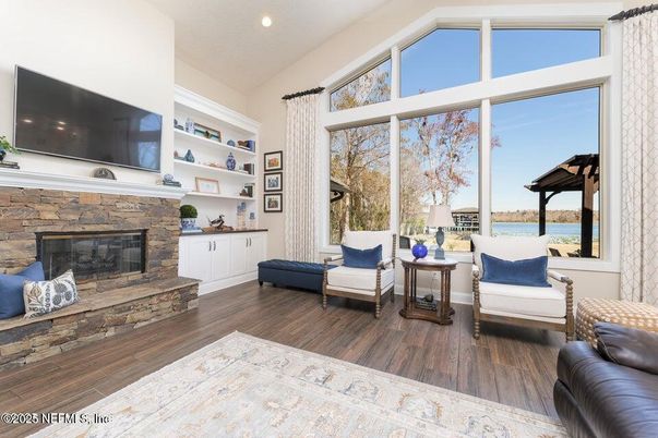 Fireplace, Interior, Living room, Recessed Lighting, Water, Wood Texture Flooring