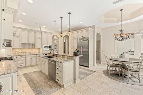 Chandelier, Dining room, Interior, Kitchen, Pendant Lights, Recessed Lighting, Stainless Steel Appliances