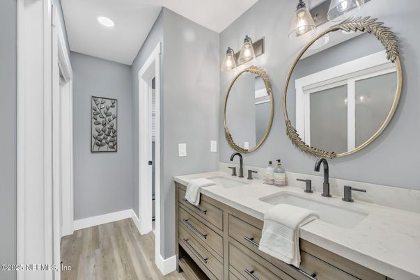 Bathroom, Dual Sink Vanities, Interior, Recessed Lighting, Wood Texture Flooring