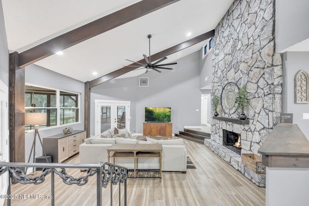 Fireplace, Interior, Living room, Recessed Lighting, Stone Walls, Wooden Beams, Wood Texture Flooring