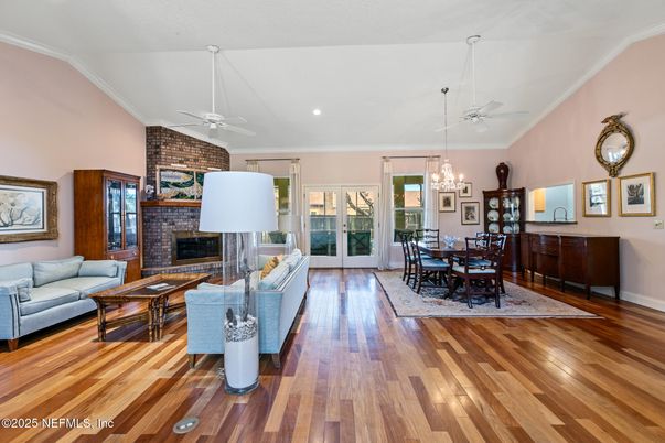 Chandelier, Dining room, Fireplace, Interior, Living room, Recessed Lighting, Stone Walls, Wood Texture Flooring