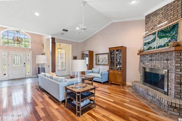 Fireplace, Interior, Living room, Recessed Lighting, Stone Walls, Wood Texture Flooring