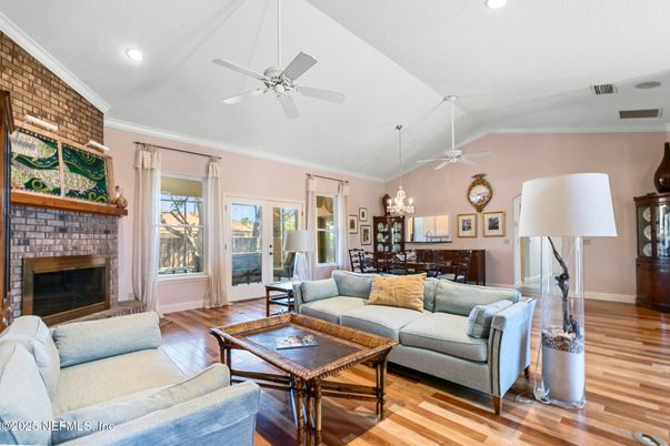Chandelier, Dining room, Fireplace, Interior, Living room, Recessed Lighting, Stone Walls, Wood Texture Flooring