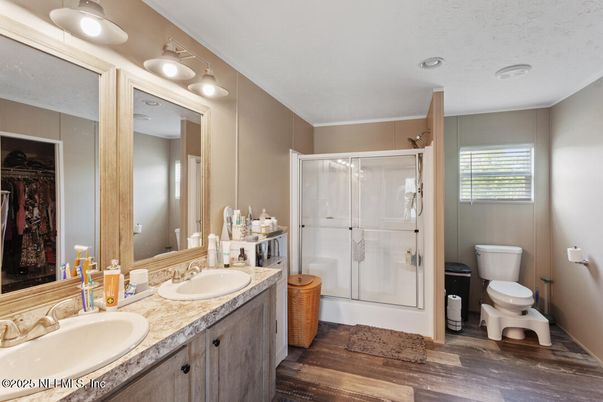 Bathroom, Dual Sink Vanities, Glass Shower, Interior, Wood Texture Flooring