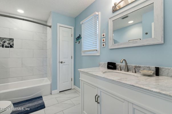 Bathroom, Dual Sink Vanities, Interior, Marble, Marble Walls, Recessed Lighting