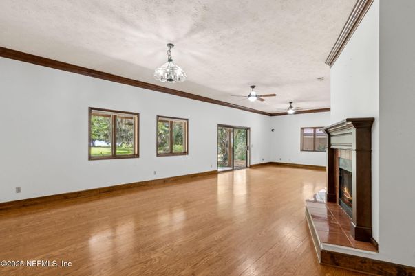 Empty room, Fireplace, Interior, Pendant Lights, Wood Texture Flooring