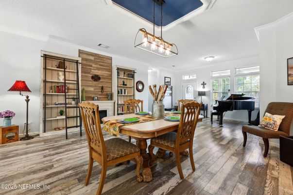 Dining room, Fireplace, Interior, Pendant Lights, Piano, Wood Texture Flooring, Wooden Walls