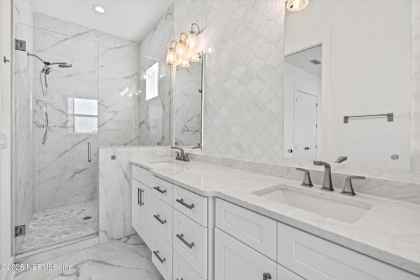 Bathroom, Dual Sink Vanities, Glass Shower, Interior, Marble, Marble Walls, Recessed Lighting