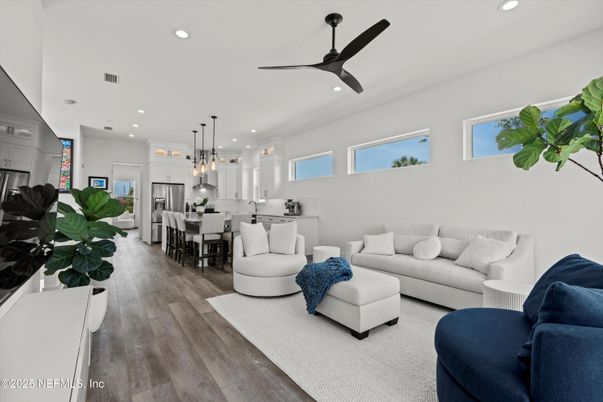 Dining room, Interior, Kitchen, Living room, Pendant Lights, Recessed Lighting, Stainless Steel Appliances, Wood Texture Flooring