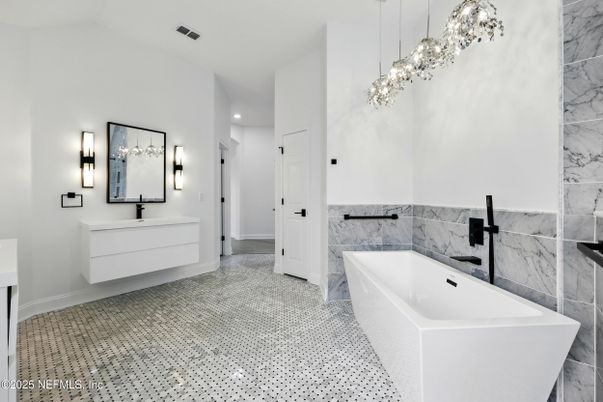 Bathroom, Dual Sink Vanities, Free Standing Baths, Interior, Marble Walls, Pendant Lights, Recessed Lighting