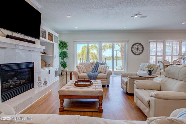Fireplace, Interior, Living room, Recessed Lighting, Wood Texture Flooring