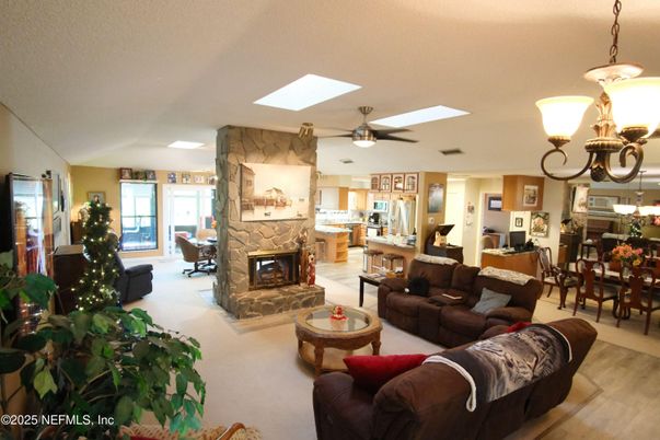 Dining room, Fireplace, Interior, Kitchen, Living room, Pendant Lights, Wood Texture Flooring