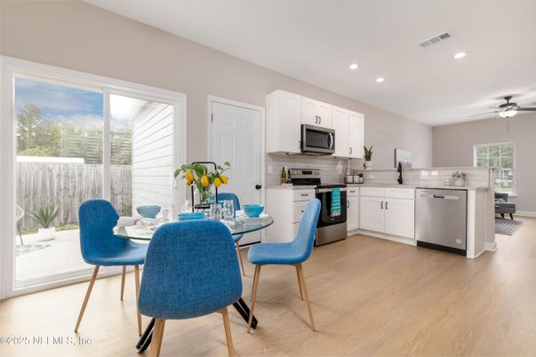 Dining room, Interior, Kitchen, Recessed Lighting, Stainless Steel Appliances, Wood Texture Flooring