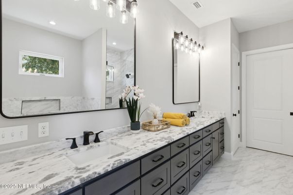 Bathroom, Dual Sink Vanities, Interior, Marble, Marble Walls, Recessed Lighting