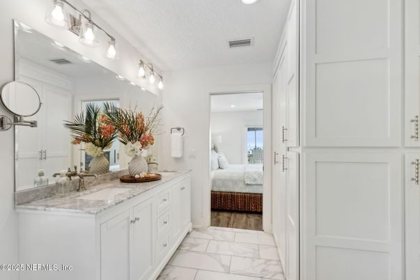 Bathroom, Bedroom, Dual Sink Vanities, Interior, Marble, Recessed Lighting, Wood Texture Flooring