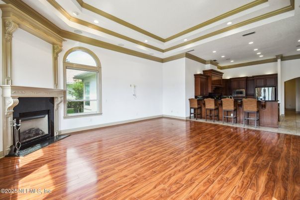 Empty room, Fireplace, Interior, Kitchen, Recessed Lighting, Wood Texture Flooring