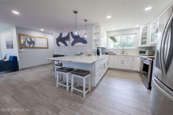 Interior, Kitchen, Pendant Lights, Recessed Lighting, Stainless Steel Appliances, Wood Texture Flooring