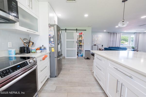 Interior, Kitchen, Pendant Lights, Recessed Lighting, Stainless Steel Appliances, Wood Texture Flooring