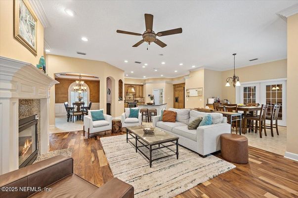 Chandelier, Dining room, Fireplace, Interior, Kitchen, Living room, Pendant Lights, Recessed Lighting, Wood Texture Flooring