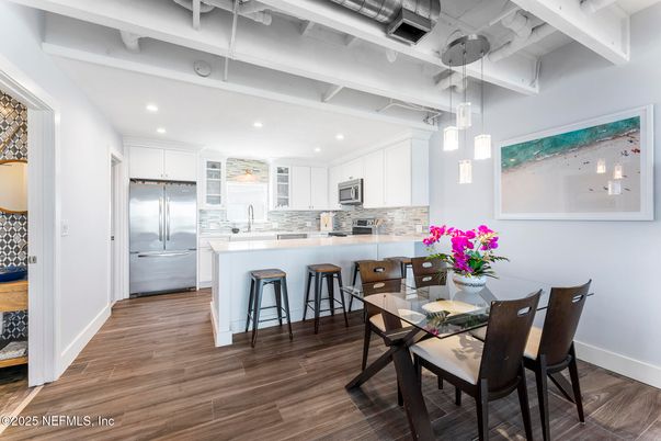 Dining room, Interior, Kitchen, Pendant Lights, Recessed Lighting, Stainless Steel Appliances, Wood Texture Flooring